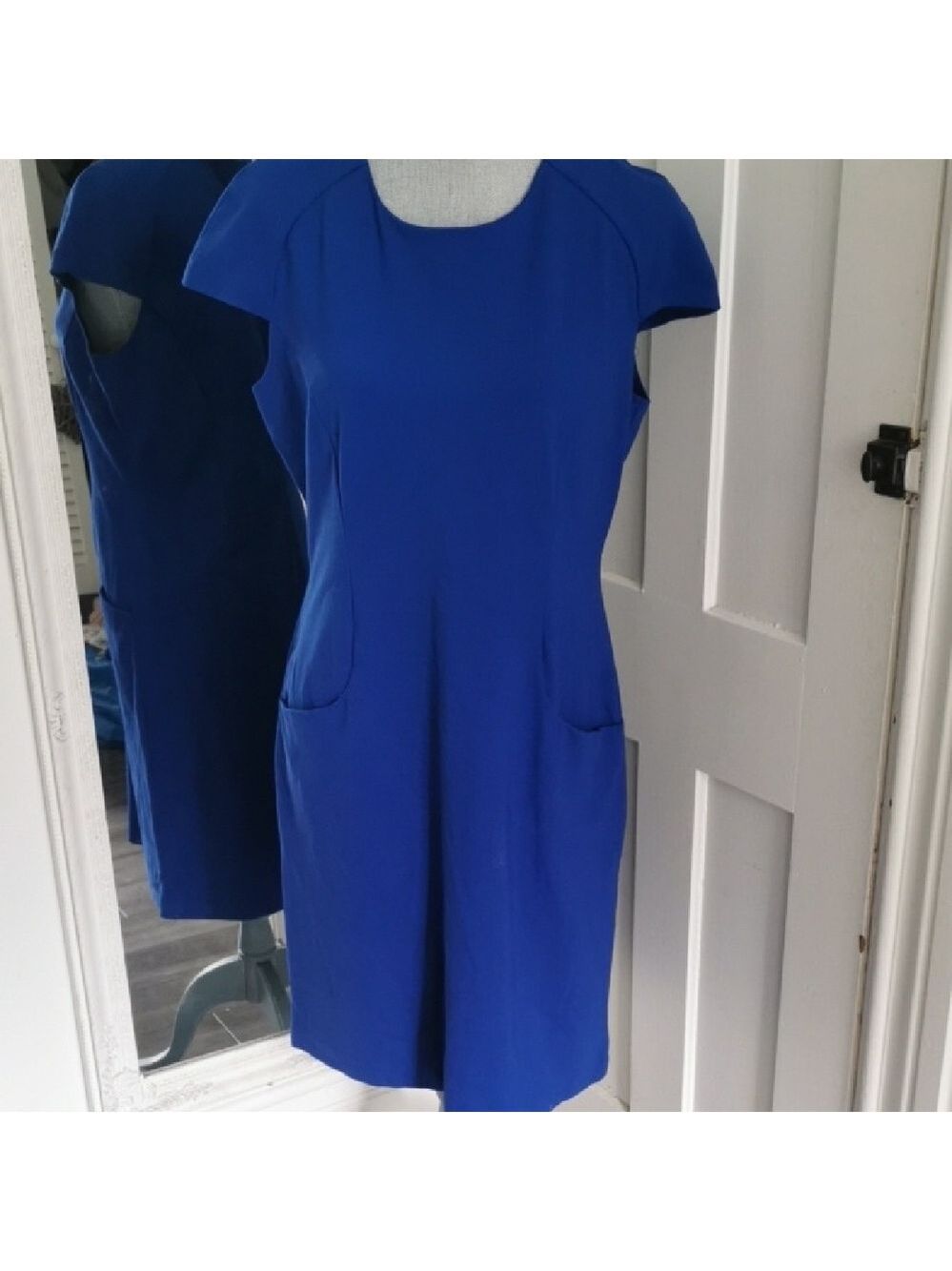 Attitude Klein Blue shift sleevelessdress with frontpockets.Midi length. Size 14